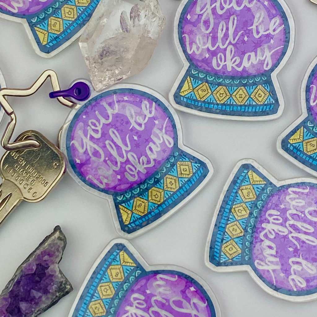 Decorative stickers with 'You will be okay' text on a white background with crystals.